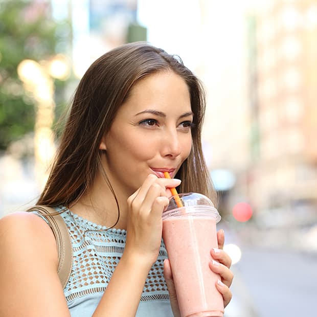 Image: Woman drinking a smoothie